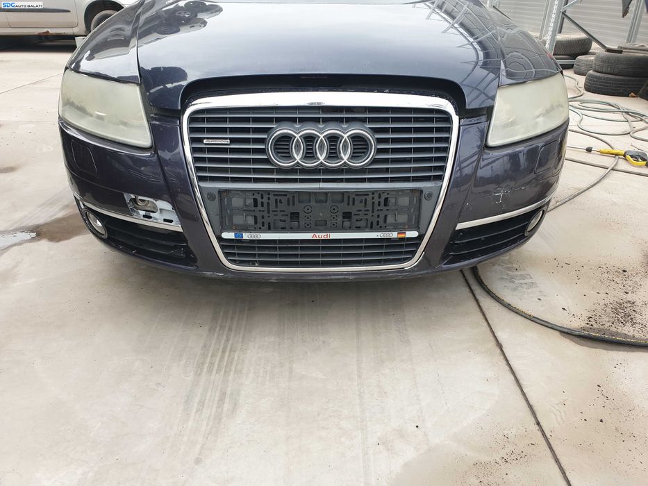 Bara Spoiler Fata Goala cu Grila si Emblema cu Defecte Audi A6 C6 NFL Non Facelift 2004 - 2008 Culoare Oyster Grey Met LZ7Q [K8514] [K8515]