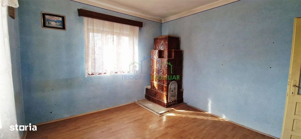 Casa Bradesti , teren  intravilan 7952 mp , deschidere 33 m la DE 70