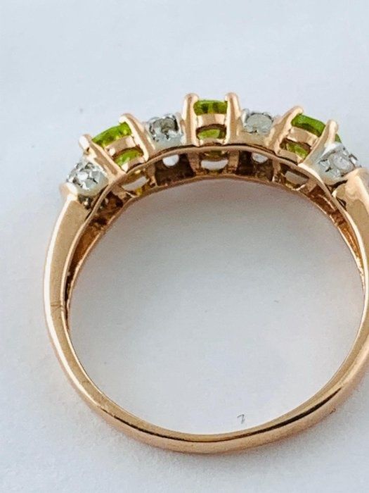 Redus  Inel aur 14 kcu peridot și diamante