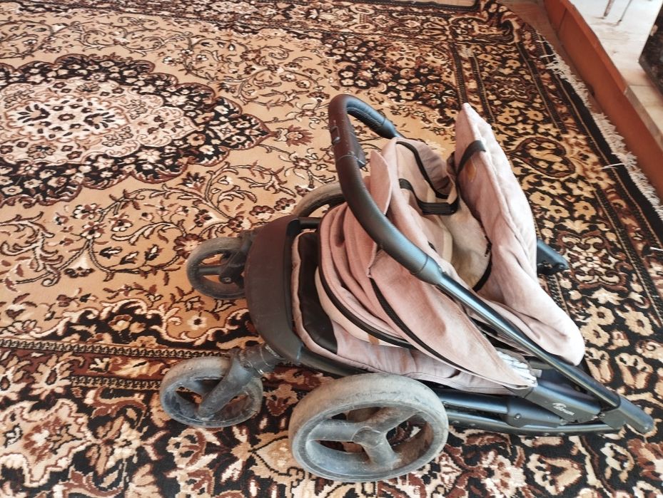 Детская коляска фирмы Teknum