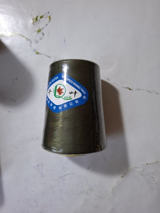 Нитки швейные машины.