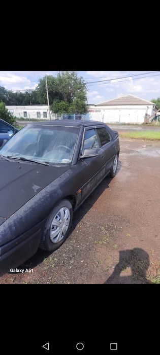 Продам машину Мазда323