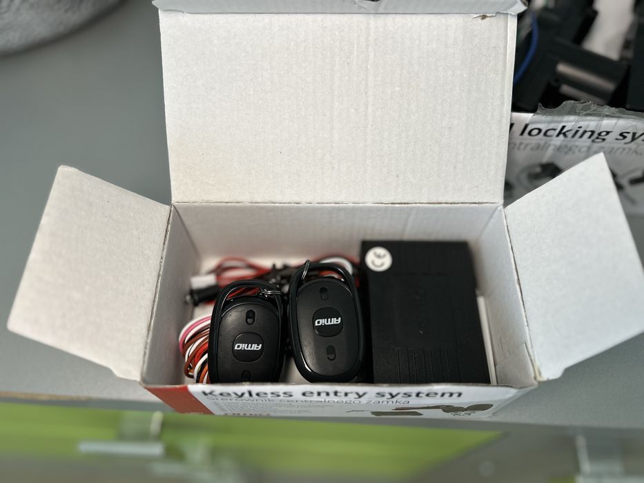 Amio - Modul închidere centralizată cu actuator și două telecomenzi