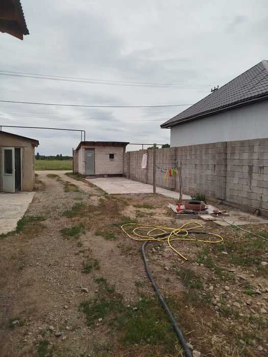 Два дома в одном участке