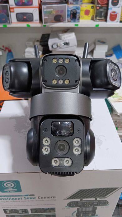 Тройна Соларна безжична водоустойчива камера WIFI 12MP въртяща осветяване
