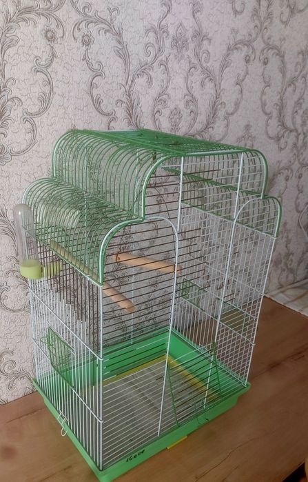 Клетка для попугаев...