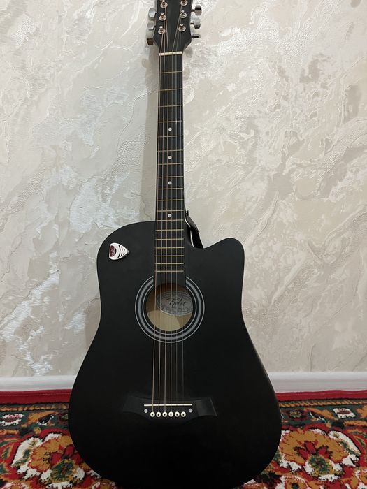 Cllasic gitara chalinmagan toptoza 550ming atalgani