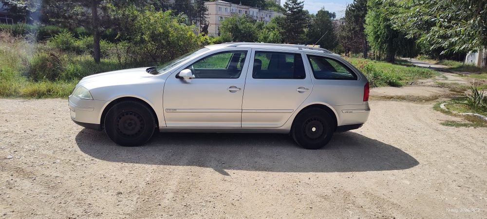 Skoda Octavia 2 ELEGANCE 2006, dublu climatronic,navigație,1,6 FSI, benzina,euro4,115cp 238133km =2900 euro neg.