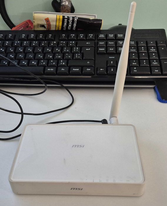Рутер Linksys WRT120N и Рутер MSI RG300EX Lite