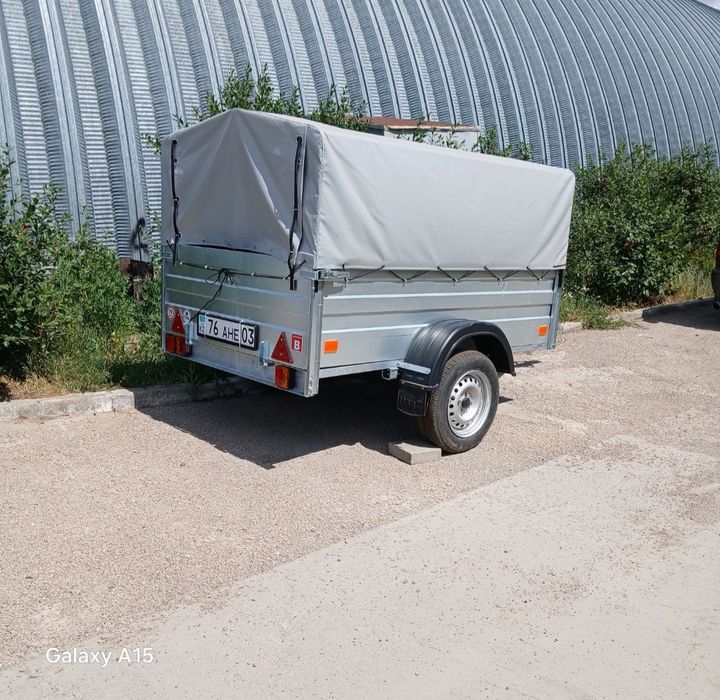 Продам мазду с прицепом.
