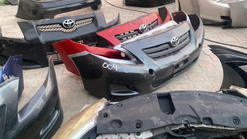 Передний бампер Королла 150