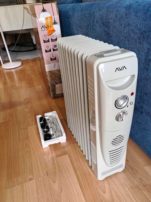 продам обогреватель масляный