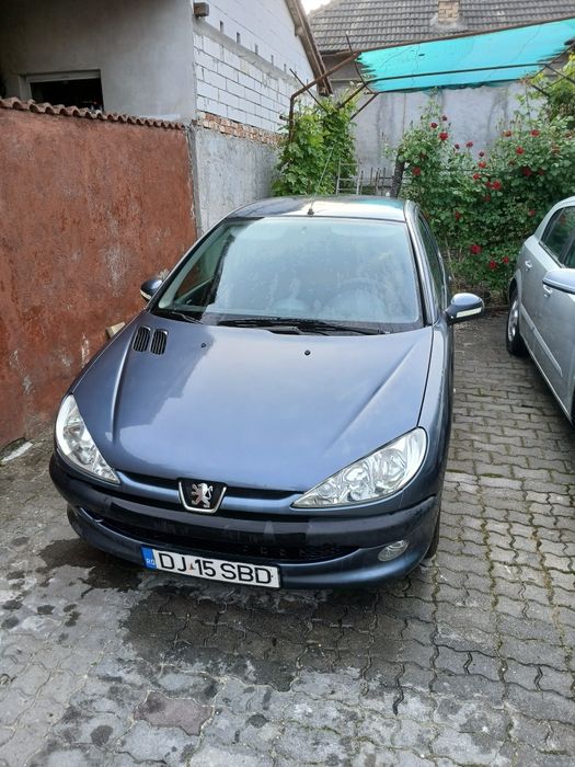 Vand Opel Astra h 1.7 cdtj si peugeot 206 1.4 hdi