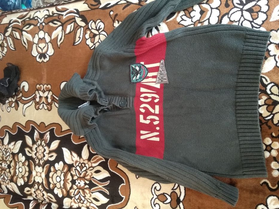 Кофты и свитера..