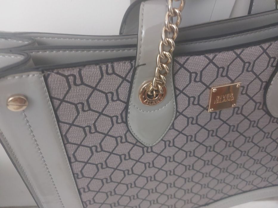 Нова,оригинална чанта на River island,удобна,практична,стилна