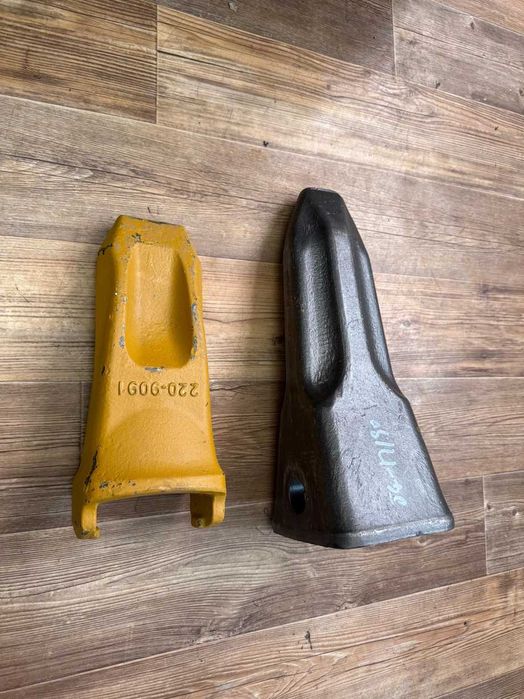 Зуб ковша разных видов экскаваторов