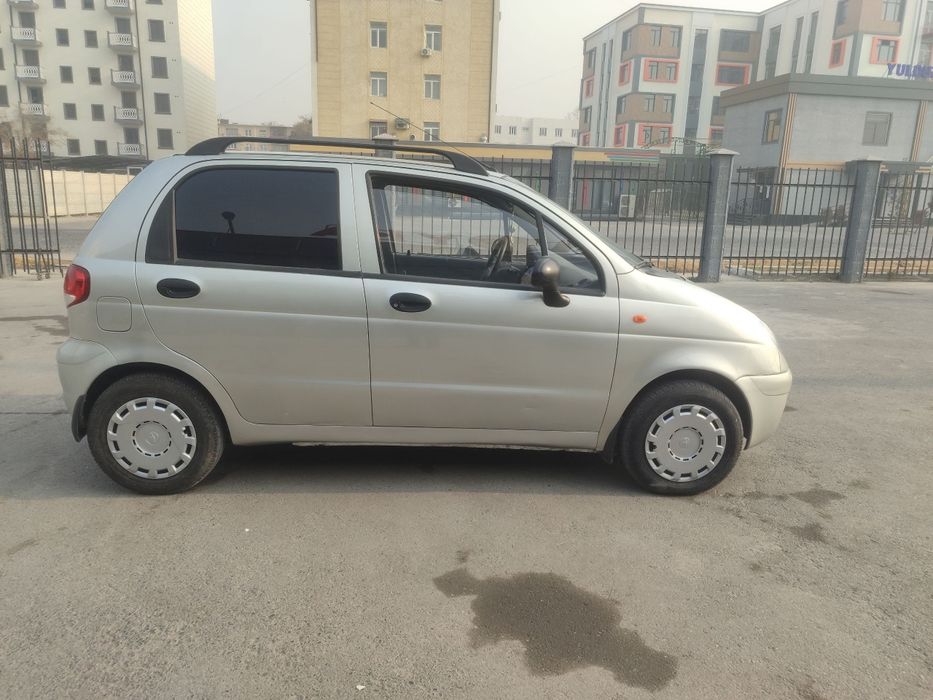 Матиз Автомат 2009 краска  30%  олди орака печат 4та юмшок янги балон