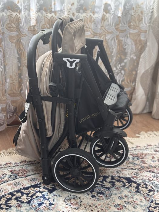 Продам детскую прогулочную коляску Ining baby