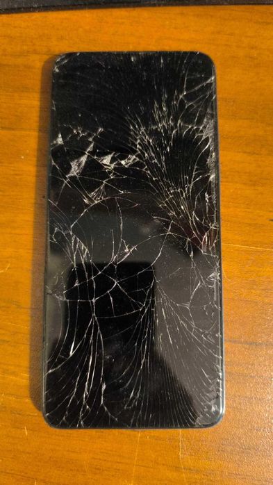 Телефони за части