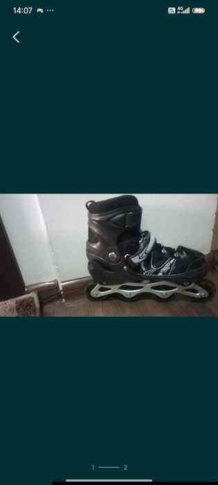 Роликовые коньки