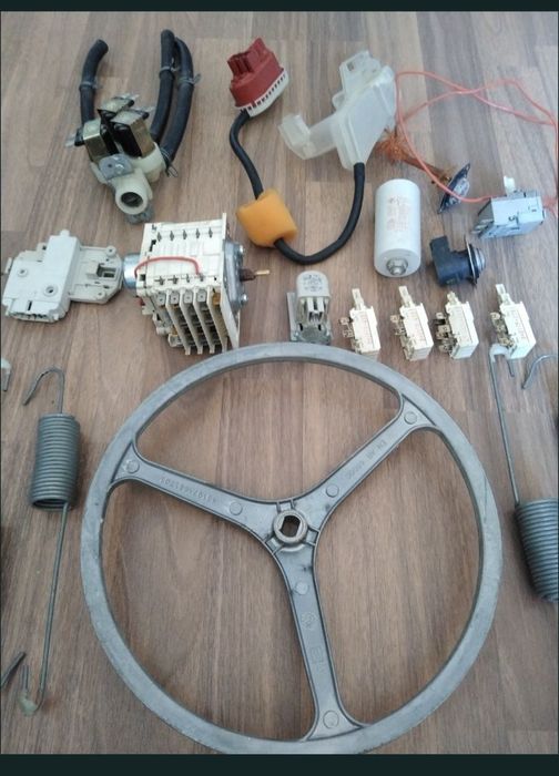 Piese electrice și mecanice pentru masini de spalat