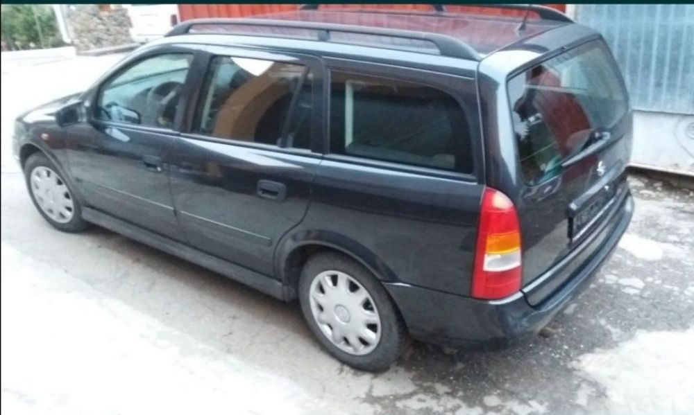 Aripa dreapta fata opel astra g break 1.6i 16v benzina negru z266