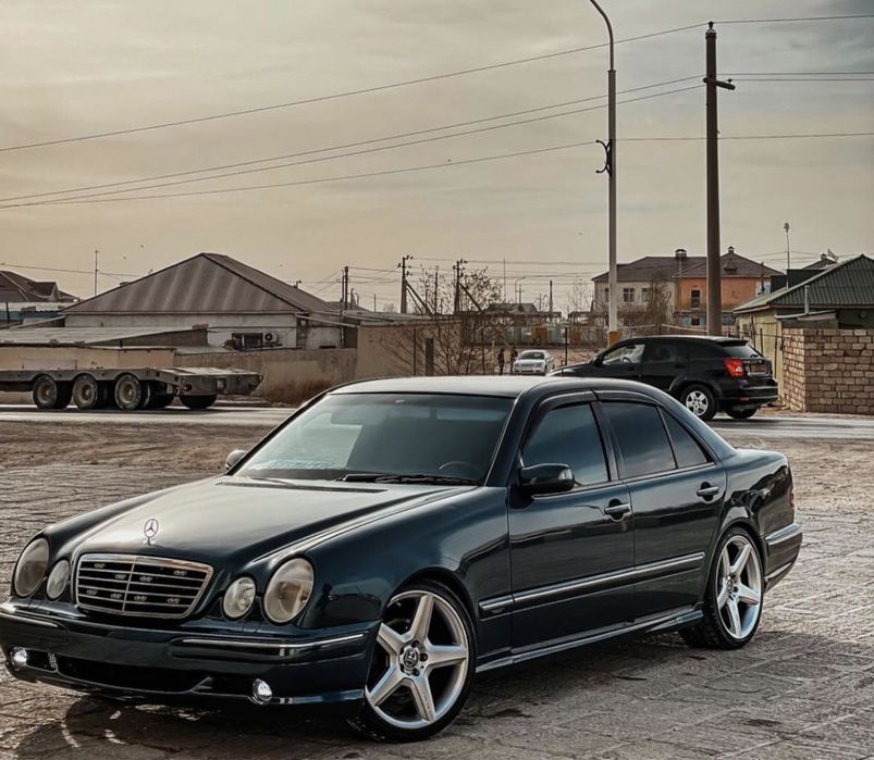 Бампер для мерседес Е55 amg рестайлинг