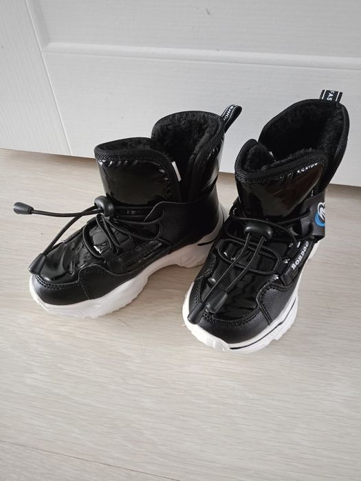 Продам новые сапоги