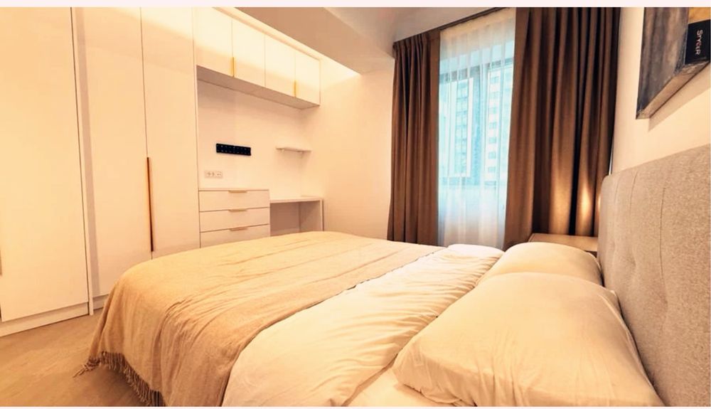 Ofer spre inchiriere ap 3 camere Cortina North cu 2 locuri parcare