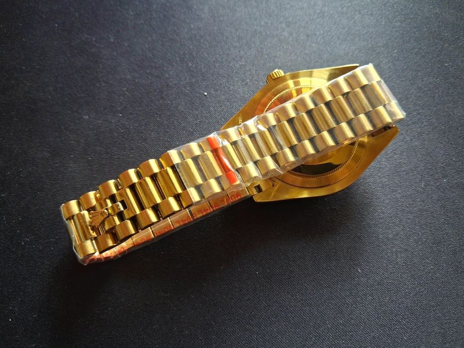 Rolex  Submariner, Day-Date Gold