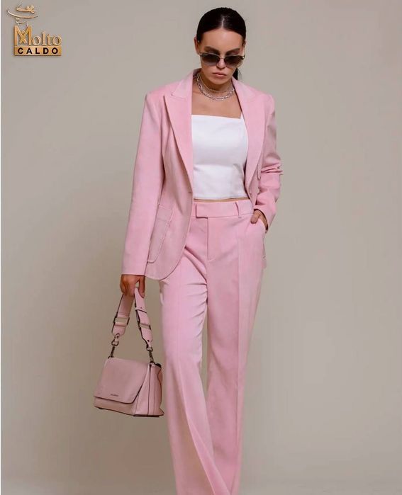 Розовые вельветовые брюки