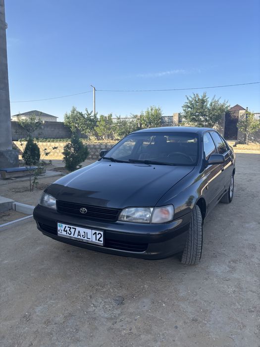 Тойота карина Е