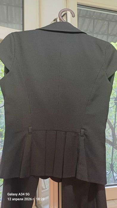 Костюм брючный женский в отличном состоянии.