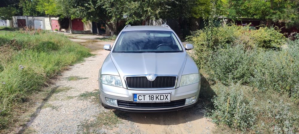 Skoda Octavia 2 ELEGANCE 2006, dublu climatronic,navigație,1,6 FSI, benzina,euro4,115cp 238133km =2900 euro neg.