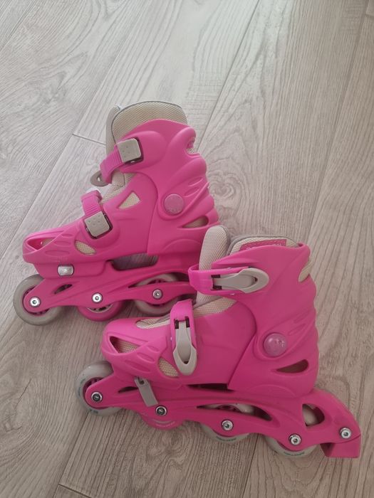 Роликовые коньки