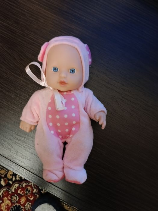 Куклы говорящая в розовой одежде