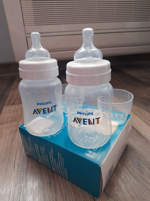 4бр. Шишета Philips avent и Поставка за чаша