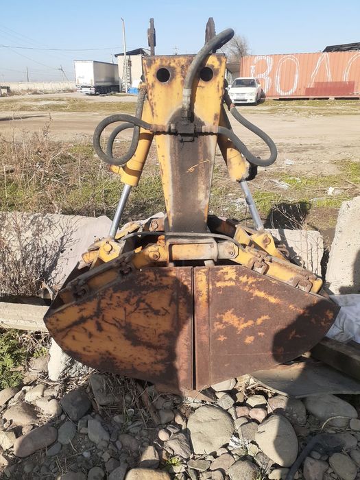 Двухчелюстный ковш