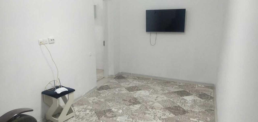 In the Yashnabad district, a two-room apartment is for rent.