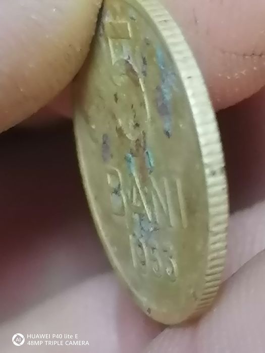 Monede euro și un bănuț de 5 românesc