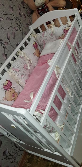 Детская кроватка-маятник