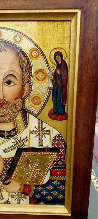Icoană religioasă pictată pe sticlă.
