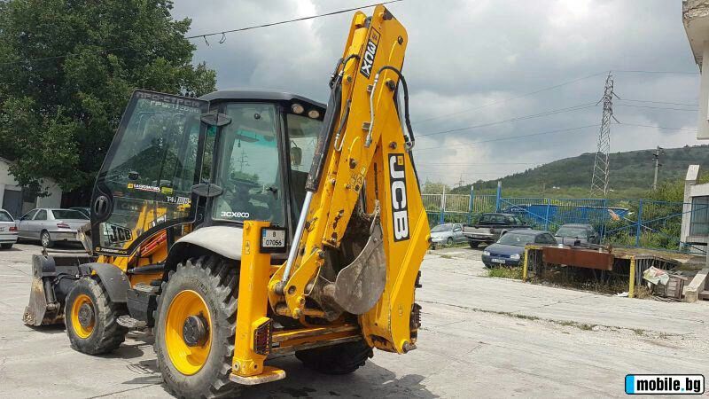 Услуги с комбиниран багер  хидравличен чук и палетни вилици