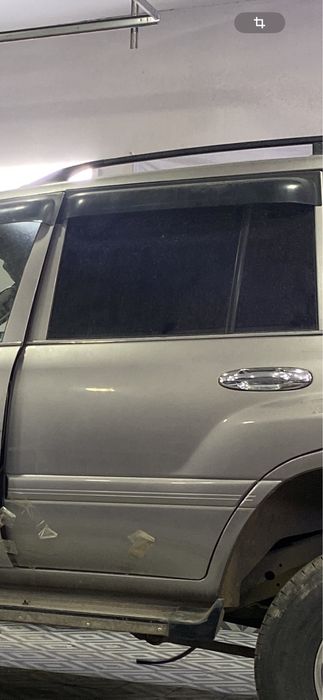 Дверь левый задний на  Toyota land cruiser 105 GX 2005 гв