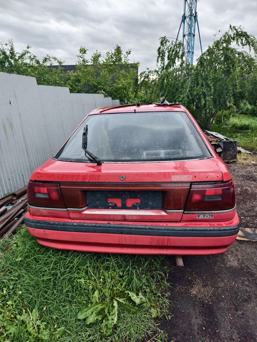 Машина Mazda  626