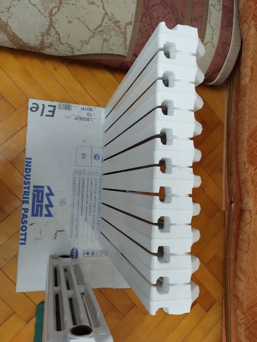 2 Calorifere de fontă,aproape noi