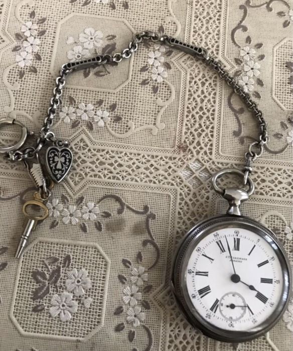 Часы серебрянные