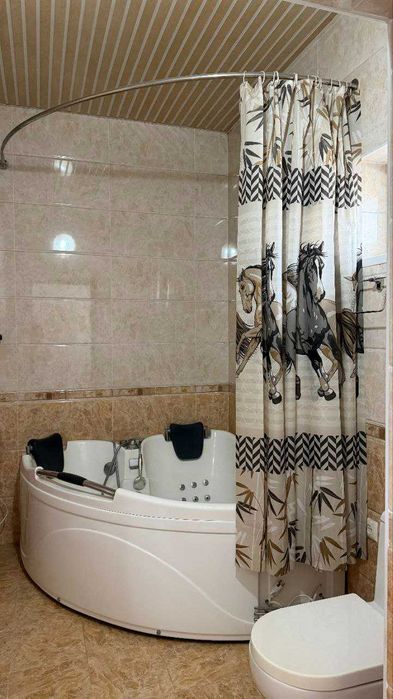 Продам угловой дом на участке 6 соток в центре Кибрая