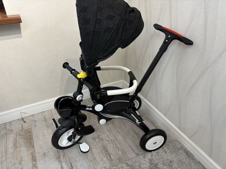 Трехколесный велосипед с ручкой