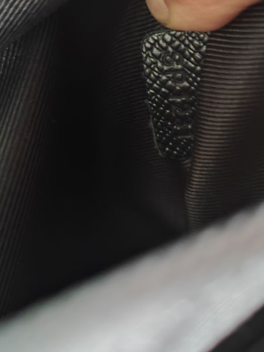 Louis Vuitton sling bag taiga